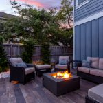 Beautiful,Backyard,Firepit,At,Dusk,With,Comfortable,Chairs